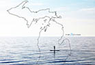 Michigan map overlayed on paddle-boarder.
